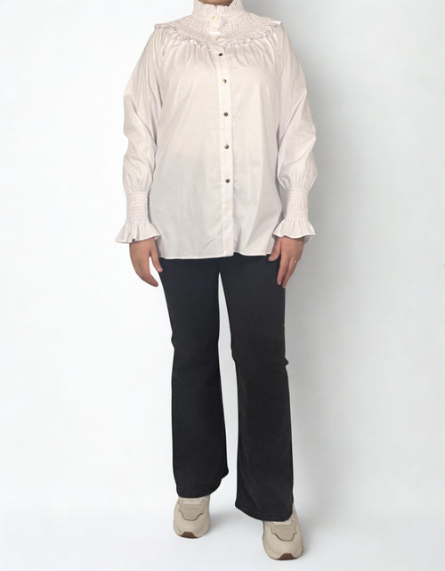 Elegante Bluse mit femininen Details