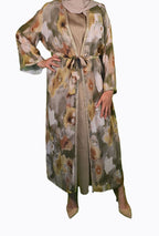 Kleid mit Blumenmuster und goldenen Details