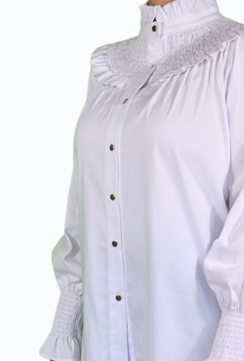 Camicia elegante con dettagli femminili
